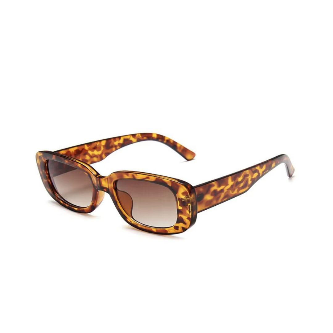 Tortoiseshell rectangular sunglasses with a thick, patterned frame and gradient brown lenses for a stylish and classic look.